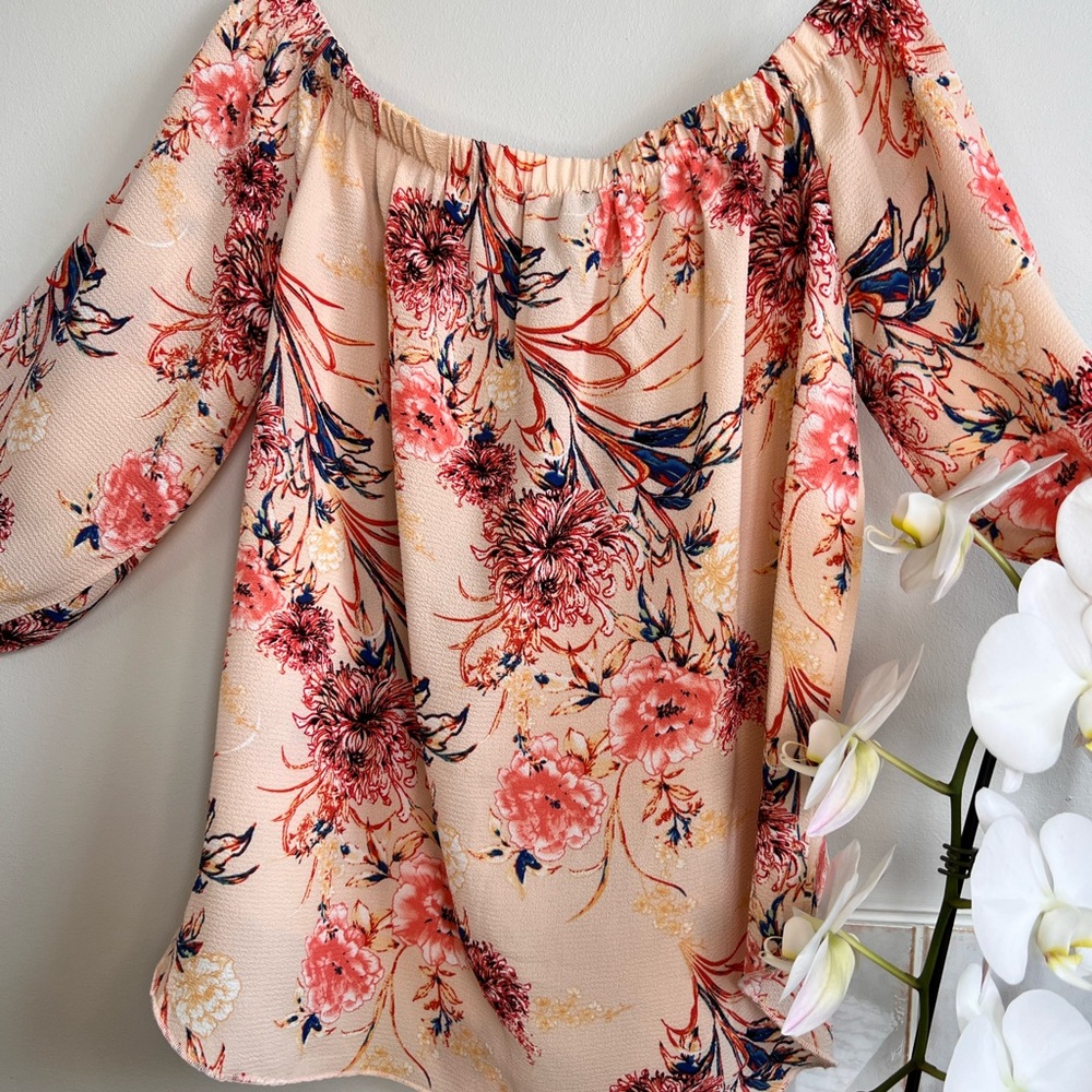 Off-shoulder women’s floral blouse with sleeves